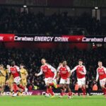 Arsenal players celebrating their Carabao Cup semi-final win