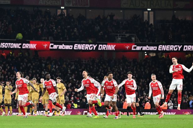 Arsenal players celebrating their Carabao Cup semi-final win