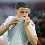 Joueurs de football célébrant un but lors d'un match de la CAN 2025