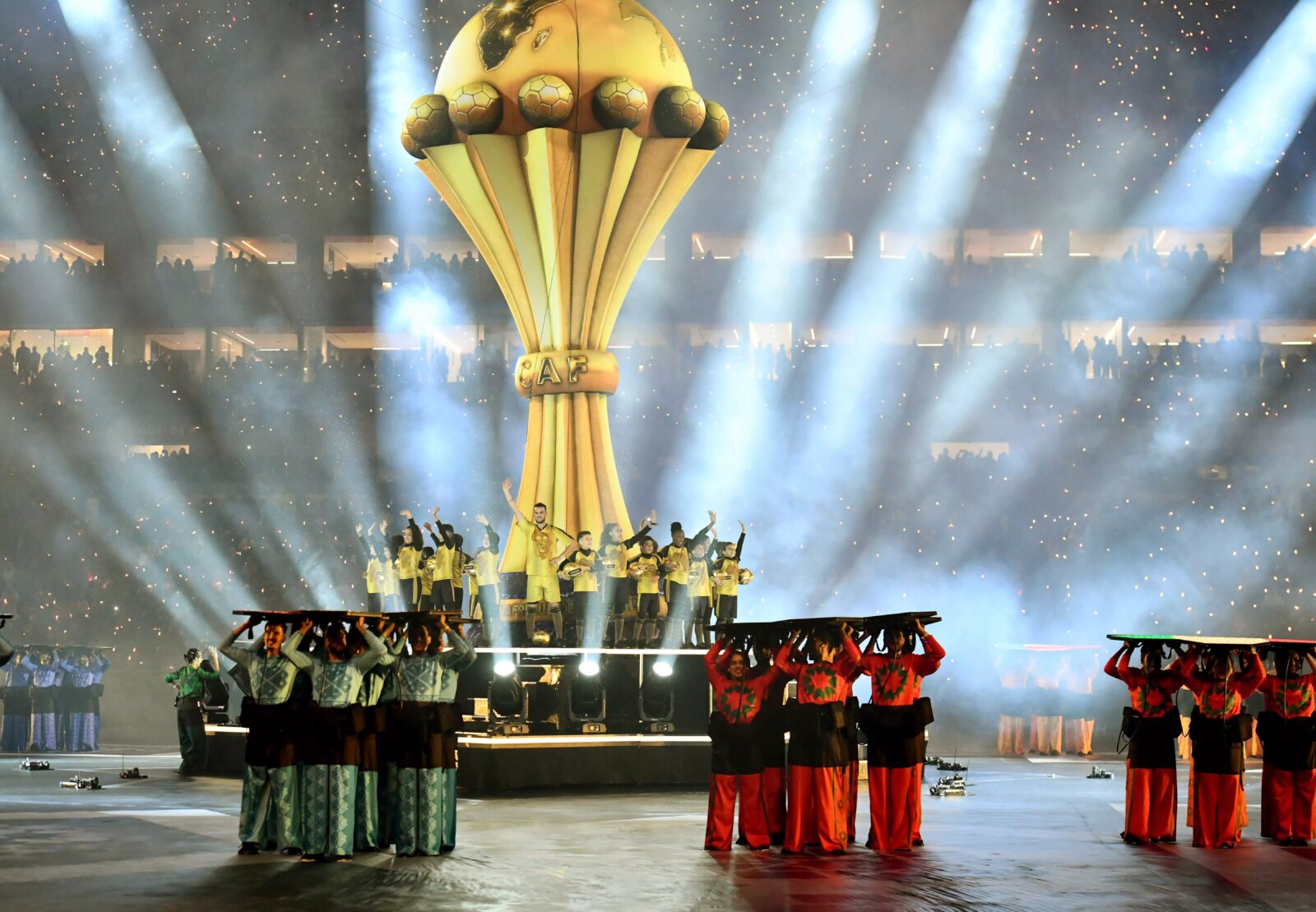 Logo officiel de la CAN 2025 avec un ballon de football et le drapeau marocain