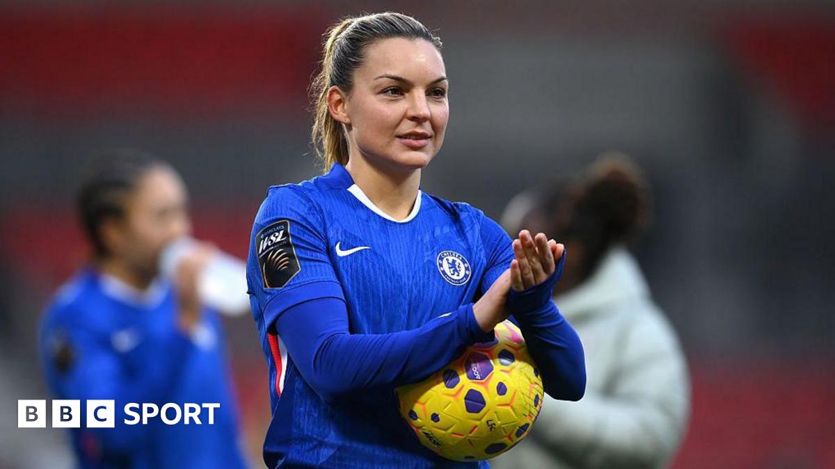 Chelsea players celebrating a goal against Liverpool.