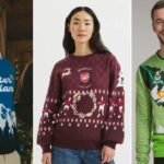 Alt text for the image: "Football fans wearing festive sweaters"