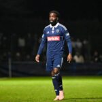 Les joueurs de Lille célèbrent leur victoire contre US Lusitanos. Texte Alt : Les joueurs de Lille célèbrent leur victoire.