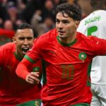 ** صورة للاعب إبراهيم دياز في اللحظة التي حصل فيها على هدف، مع خلفية الملعب وجماهير المباراة.