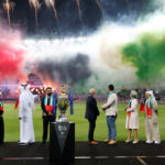 ** صورة للشعار الرسمي ل DP World ILT20، مع خلفية ملونة ورموز رياضية.