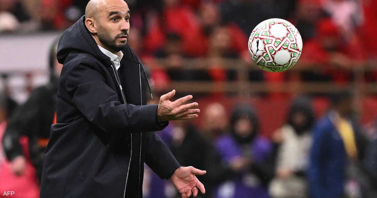 ** صورة لمنتخب المغرب يلعب ضد جزر القمر في كأس أمم إفريقيا.