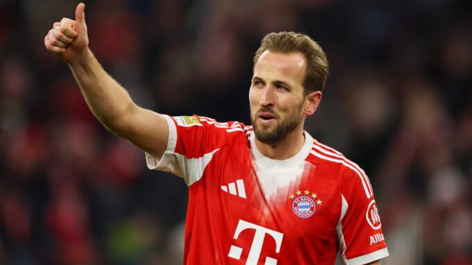 Harry Kane celebrating his 50th goal for Bayern Munich in 2025.