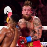 Alt text for the image: Jake Paul in the ring with Anthony Joshua