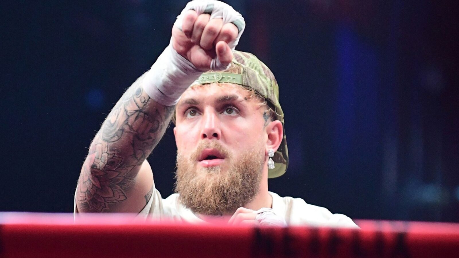 Jake Paul and Lawrence Okolie in the ring