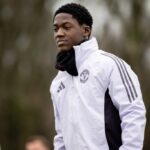 Kobbie Mainoo in action for Manchester United.