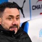 Un joueur de l'Olympique de Marseille en action face à l'ASM Monaco.