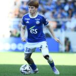 Un joueur du Racing Club de Strasbourg en action sur le terrain.