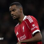 Liverpool striker Alexander Isak in action on the pitch.