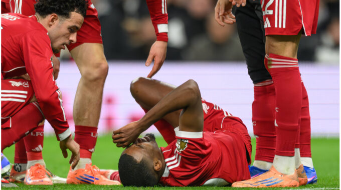 Liverpool players celebrating a goal at Tottenham Hotspur Stadium
