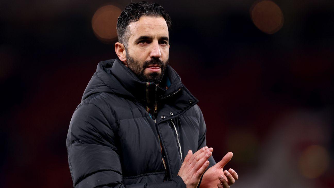 Manchester United team celebrating a goal.