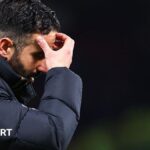 Manchester United players celebrating a goal against Bournemouth.