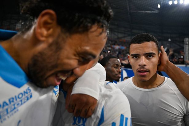 Mason Greenwood celebrates his goal with teammates at the Stade Velodrome.