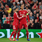 Virgil van Dijk and Mohamed Salah in action for Liverpool FC.