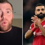 Mohamed Salah celebrating a goal with Liverpool fans.