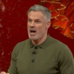 Mohamed Salah waving to the Anfield crowd after providing an assist against Brighton.