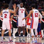 Pistons players on the court