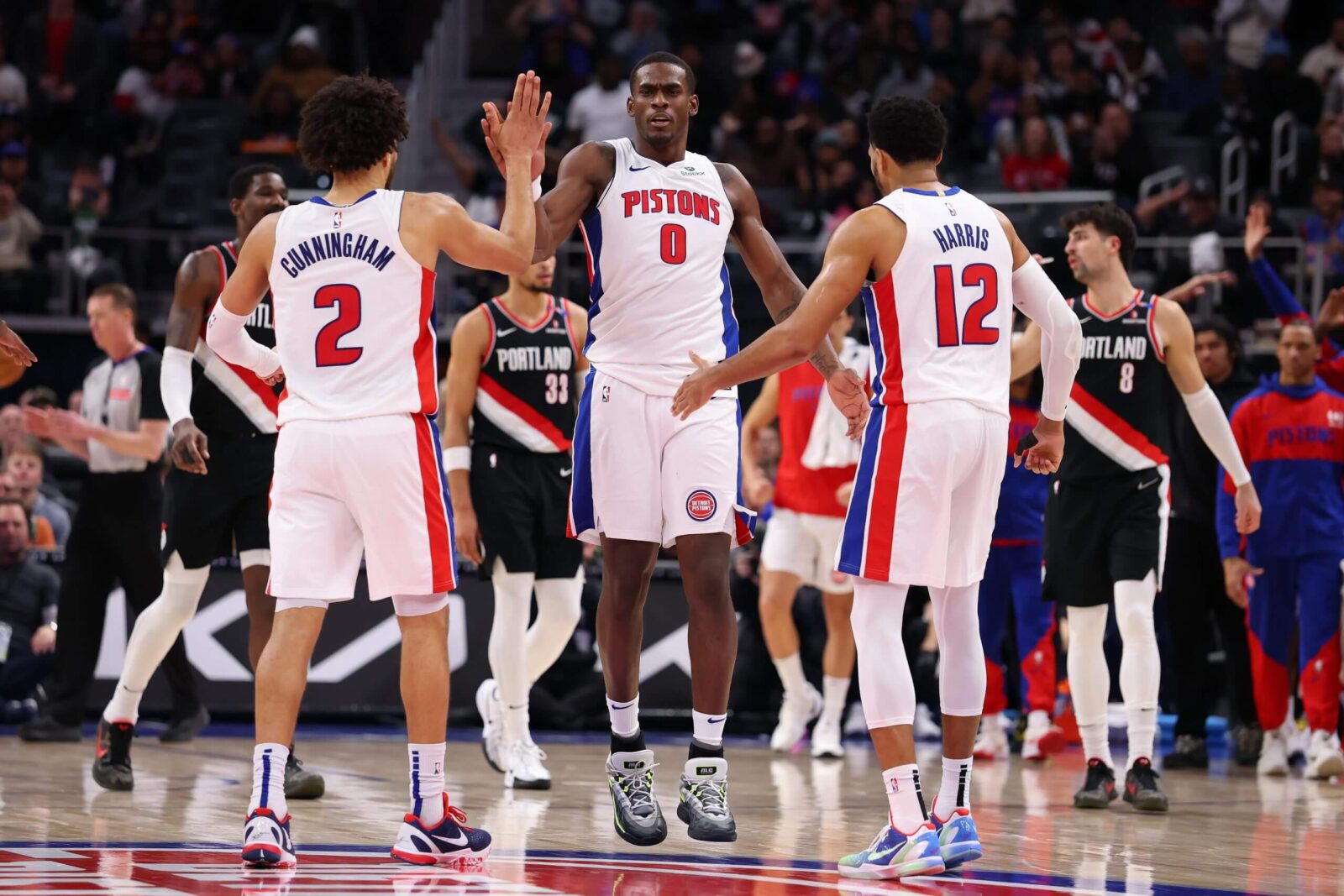Pistons players on the court