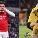 A group of football players celebrating on the pitch.