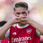 L'équipe d'Arsenal célébrant son but contre Everton.