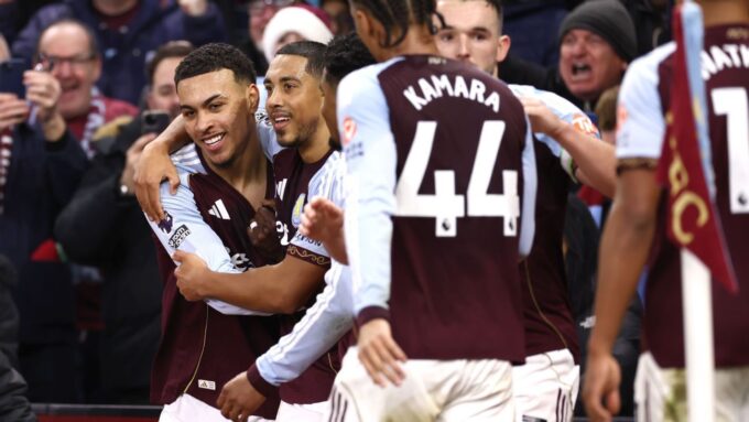 Aston Villa players celebrating a goal at Villa Park.