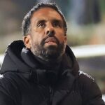 Scottish football fans cheering at a match