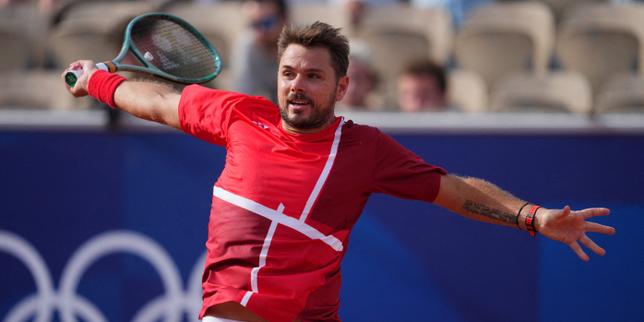 Tennisman suisse Stan Wawrinka en action sur le court.