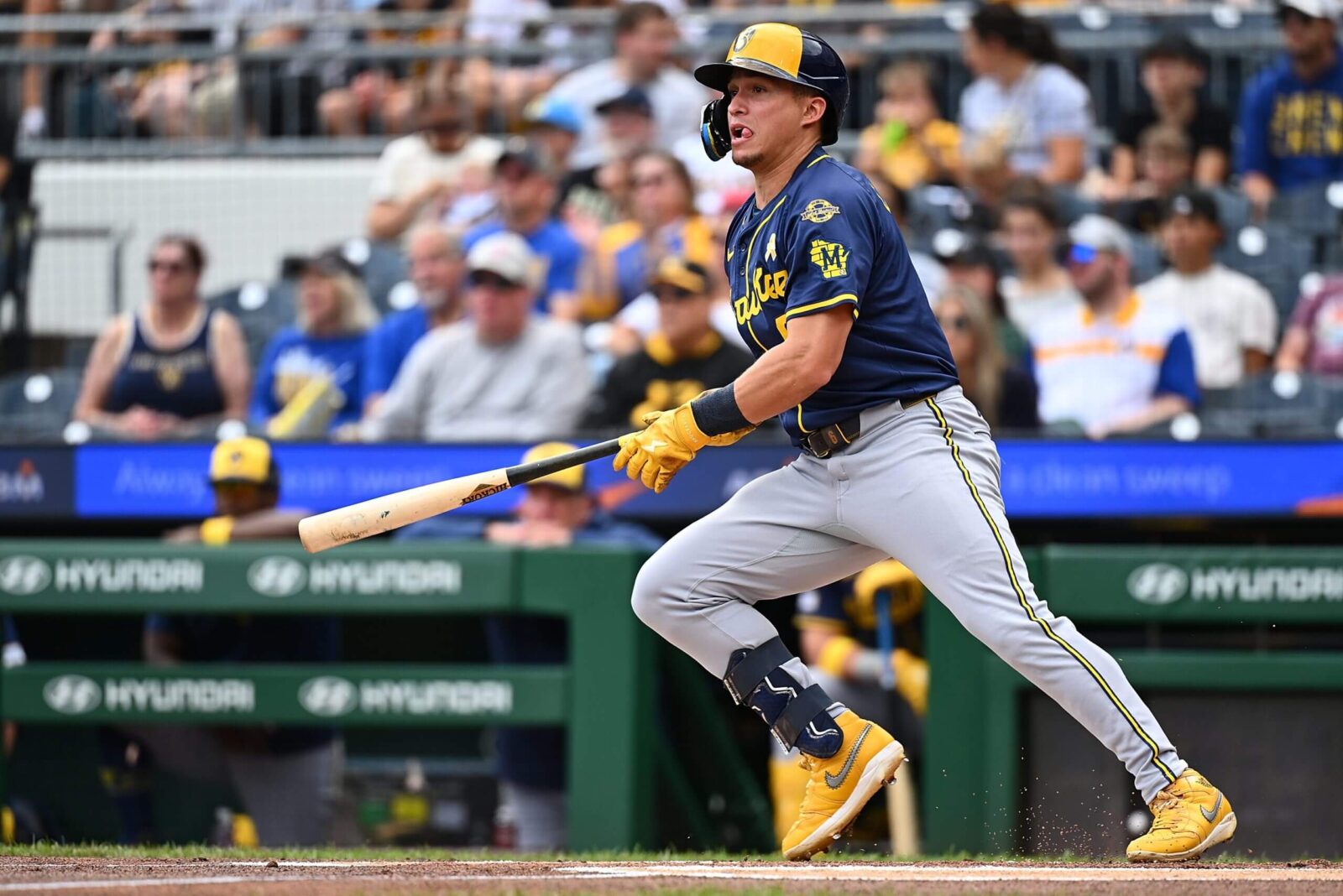 A photo of a baseball field with a trade graphic overlay.