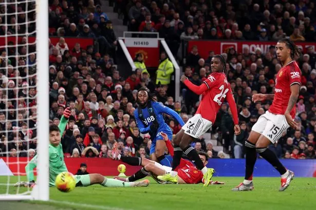 Antoine Semenyo scores against Manchester United at Old Trafford.